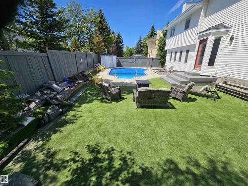 Grand back yard, perfect for entertaining, in-ground heated pool, low maintenance turf - 15 Paquette Place, St. Albert, AB 