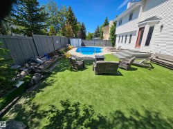 Grand back yard, perfect for entertaining, in-ground heated pool, low maintenance turf - 
