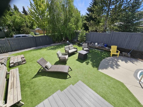 Grand back yard, perfect for entertaining, in-ground heated pool, low maintenance turf - 15 Paquette Place, St. Albert, AB 