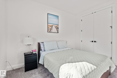 White painted walls with a textured carpeted floor - 23 Elwyck Gate, Spruce Grove, AB 