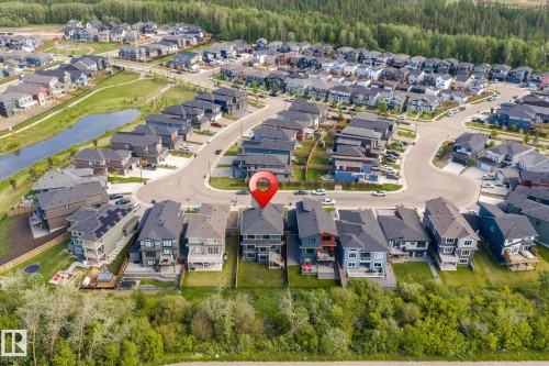 Contemporary suburban development with varied home designs and green spaces - 23 Elwyck Gate, Spruce Grove, AB 