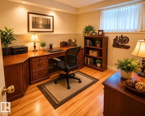 Dedicated office space featuring wood-finish flooring - 1 Munro Court, Leduc, AB 