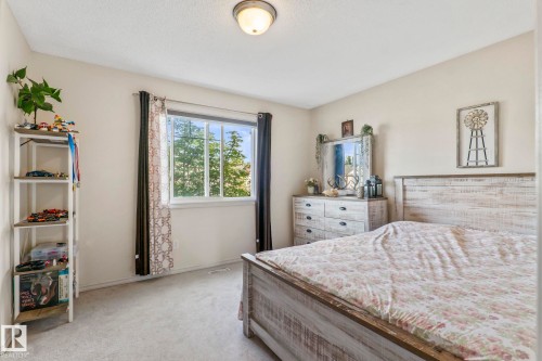 Window with white trim - 220 85St, Edmonton, AB 