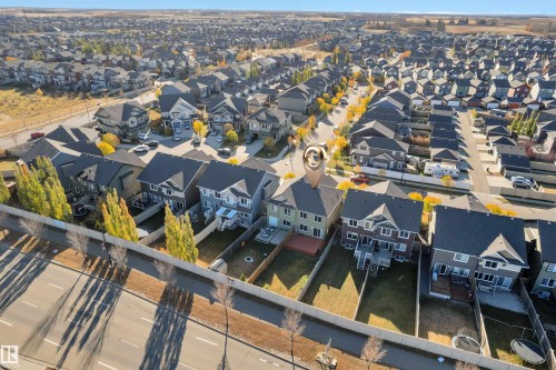 Aerial perspective showcasing a residential neighborhood with numerous detached homes - 5405 Crabapple Loop, Edmonton, AB 