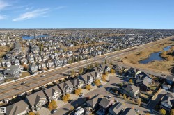 Residential development featuring a variety of single-family homes with pitched roofs - 