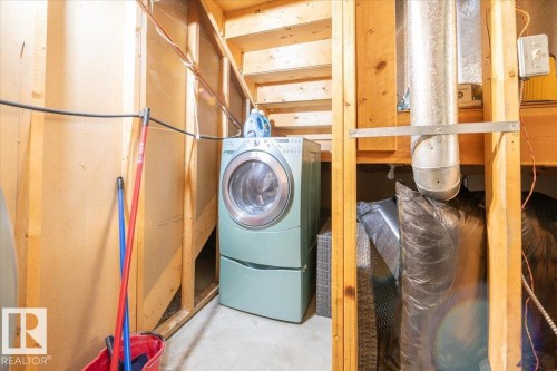 Unfinished basement area with exposed wood framing and a concrete floor - 4107 147 Street, Edmonton, AB 