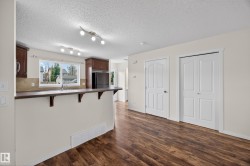 Kitchen peninsula featuring a breakfast bar and under-counter supports - 