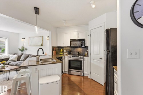 15122 33 Street, Edmonton, AB - Indoor Photo Showing Kitchen With Double Sink