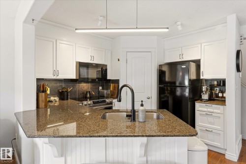 15122 33 Street, Edmonton, AB - Indoor Photo Showing Kitchen With Double Sink With Upgraded Kitchen
