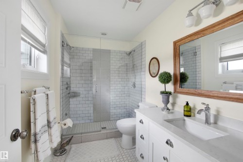 White vanity with chrome hardware and an integrated sink - 34 Falcon Road, Cold Lake, AB 