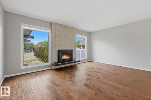 15220 124 St Nw, Edmonton, AB - Indoor Photo Showing Living Room With Fireplace