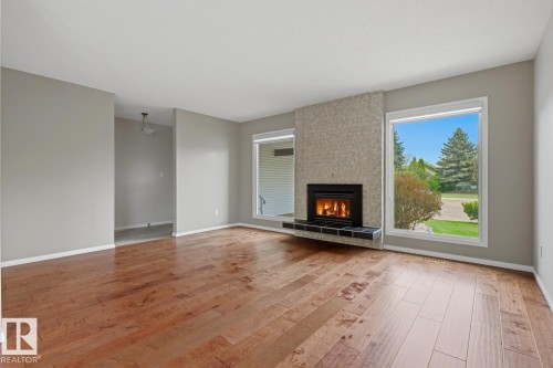15220 124 St Nw, Edmonton, AB - Indoor Photo Showing Living Room With Fireplace