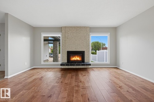 15220 124 St Nw, Edmonton, AB - Indoor Photo Showing Living Room With Fireplace