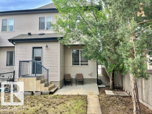 Two-story exterior with light-toned siding - 1 5281 Terwillegar Boulevard, Edmonton, AB 