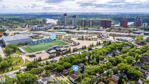 Aerial perspective showcasing a residential area with mature trees - 10866 92 Street, Edmonton, AB 