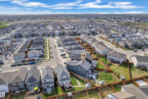 Aerial view showcasing a residential neighborhood with numerous detached homes - 17551 64 Street, Edmonton, AB 