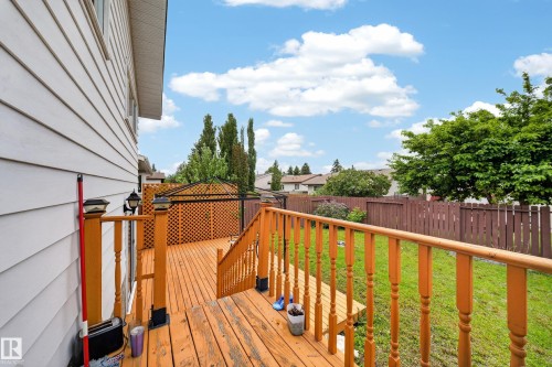 Multi-level wood deck featuring a lattice privacy screen and a dedicated gazebo area - 2832 35 Street, Edmonton, AB 