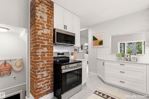 Back Entrance to Lower Level. Image Virtually Staged - 10628 73 Avenue, Edmonton, AB 