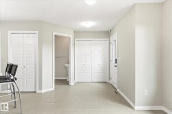 Light-toned tile flooring throughout - 
