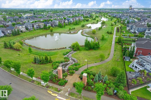 Expansive parkland with multiple ponds, a decorative fountain, and winding pathways - 9039 219 Street, Edmonton, AB 