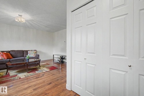 Bifold panel doors offering integrated storage - 710 Glenwright Court, Edmonton, AB 
