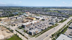 Aerial perspective showcasing a developing community with residential and commercial areas - 