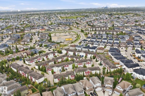 Expansive suburban landscape featuring a mix of single-family residences and multi-unit townhomes - 115 274 Mcconachie Drive, Edmonton, AB 