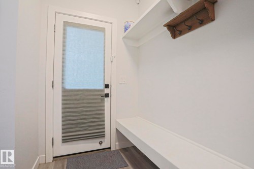 White paneled door with frosted glass and internal blinds - 10628 81 Street Nw, Edmonton, AB 