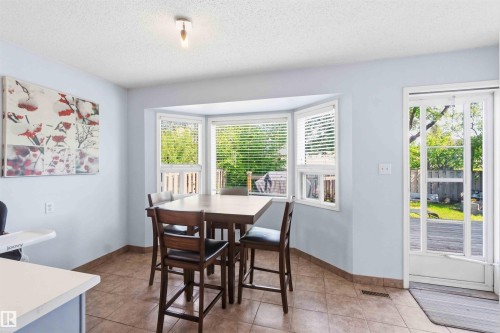 Bay window with horizontal blinds - 18808 72A Avenue, Edmonton, AB 