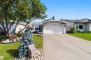 Single-story residence featuring a two-car garage and a paved driveway - 18808 72A Avenue, Edmonton, AB 