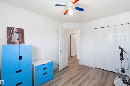 White interior walls with wood-finish flooring - 18808 72A Avenue, Edmonton, AB 