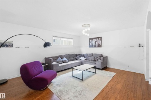 Hardwood-finish flooring extending throughout the space - 18808 72A Avenue, Edmonton, AB 