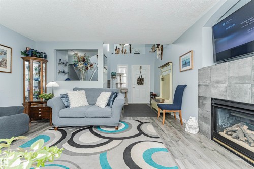 9 Langley Crescent, Spruce Grove, AB - Indoor Photo Showing Living Room With Fireplace