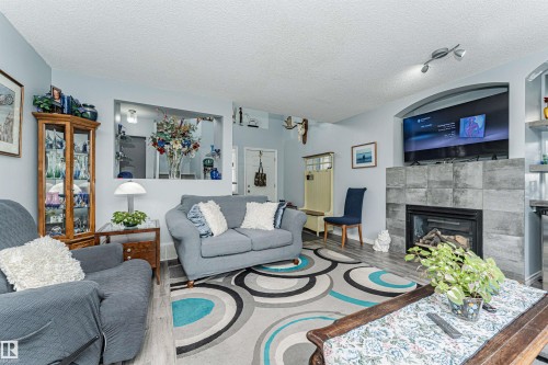 9 Langley Crescent, Spruce Grove, AB - Indoor Photo Showing Living Room With Fireplace