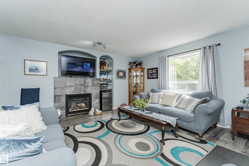 9 Langley Crescent, Spruce Grove, AB - Indoor Photo Showing Living Room With Fireplace