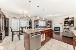 Kitchen island with granite countertop and double stainless steel sink - 