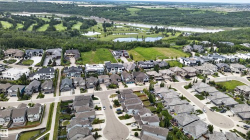 Aerial perspective showcasing a residential development with varied architectural styles - 4612 Westcliff Point(E), Edmonton, AB 