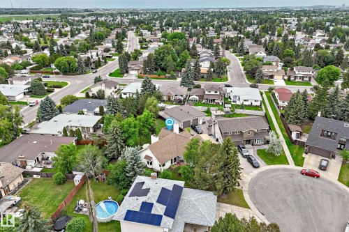 Residential property with mature landscaping and ample green space - 8224 186 Street Nw, Edmonton, AB 