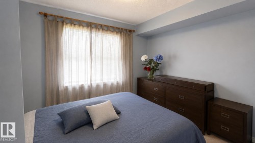 Window featuring natural light and opaque drapes - 202 13635 34 Street, Edmonton, AB 