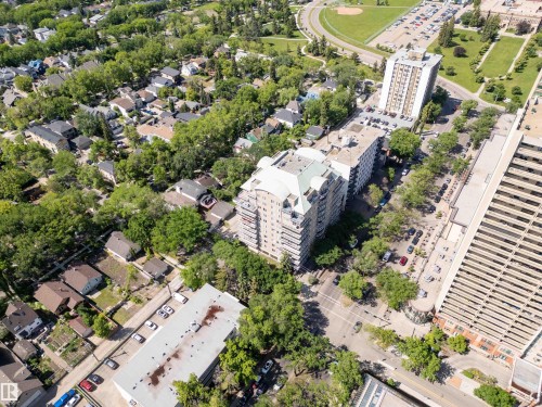 Aerial perspective showcasing a dense urban environment with a mix of residential structures and multi-story buildings - 305 11111 82 Avenue, Edmonton, AB 