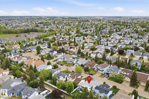 Aerial perspective of an established residential area with mature tree coverage - 3220 42A Avenue, Edmonton, AB 