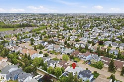 Aerial perspective of an established residential area with mature tree coverage - 