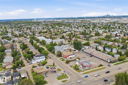 Aerial perspective showcasing a residential neighborhood with mixed-use development - 3220 42A Avenue, Edmonton, AB 