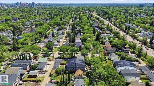 Extensive residential area featuring mature tree canopy and varied housing styles - 11012 132 Street, Edmonton, AB 