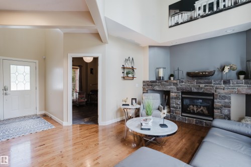 Hardwood flooring extending from the entryway - 5206 Cercle Ciel Crescent, Beaumont, AB 