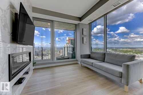 Floor-to-ceiling windows with expansive city and sky scenery - 2902 10180 103 Street, Edmonton, AB 
