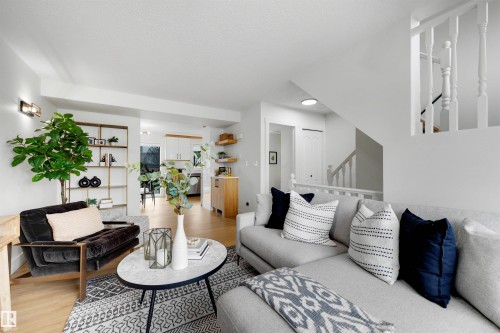 Bright open living area featuring light wood-finish flooring - 12611 47 Street, Edmonton, AB 