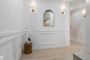 Entryway featuring decorative wainscoting and vertical wall paneling - 3305 Chickadee Drive, Edmonton, AB 