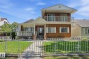Brick exterior with a second-story balcony - 12131 101 Street Nw, Edmonton, AB 