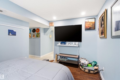 Finished room featuring light blue walls and recessed lighting - 21384 88 Avenue, Edmonton, AB 
